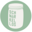 Das Bild zeigt das Logo des Unverpackt-Ladens "Schnörkellos" in Frechen. Ein Einmachglas mit Schraubdeckel auf dem "Schnörkellos" in grüner Schrift steht.